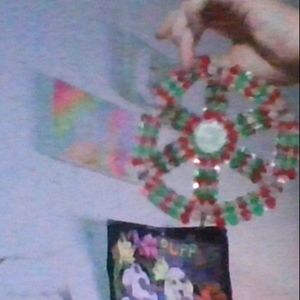 handmade bead decoratiion with diomand in middle